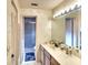 Bathroom with vanity, sink, and shower/tub combo at 380 Three Lakes Ln # L, Venice, FL 34285