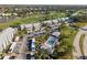 Aerial view of condo community with pool and golf course at 414 Cerromar S Cir # 249, Venice, FL 34293