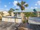 Condo building exterior with parking and storage at 414 Cerromar S Cir # 249, Venice, FL 34293