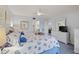 Main bedroom with king-size bed and en-suite bathroom access at 414 Cerromar S Cir # 249, Venice, FL 34293