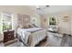Spacious bedroom with a comfy bed and plenty of natural light at 4498 Diamond E Cir, Sarasota, FL 34233