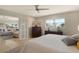 Comfortable main bedroom with king bed and access to living room at 524 Gunwale Ln, Longboat Key, FL 34228