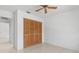 Bedroom with closet and ceiling fan at 6015 Florida St St, Punta Gorda, FL 33950