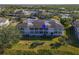 Aerial view showcasing condo location and waterfront at 636 Estuary Dr # 636, Bradenton, FL 34209