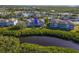 Aerial view showing condo and surrounding landscape at 636 Estuary Dr # 636, Bradenton, FL 34209