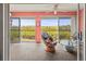 Condo lanai with wicker chairs and view at 636 Estuary Dr # 636, Bradenton, FL 34209