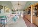 Bright living room features a comfy sectional sofa and wood flooring at 636 Estuary Dr # 636, Bradenton, FL 34209