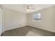 Well-lit bedroom with ceiling fan and wood-look floors at 6963 74Th Street E Cir, Bradenton, FL 34203