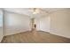 Spacious bedroom with wood-look floors and an ensuite bathroom at 6963 74Th Street E Cir, Bradenton, FL 34203