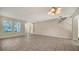 Spacious dining room with tile floors and a view of the entryway and staircase at 6963 74Th Street E Cir, Bradenton, FL 34203