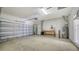 Spacious two-car garage with overhead storage and ample space at 6963 74Th Street E Cir, Bradenton, FL 34203