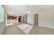 Bright living room with tile floors and kitchen views at 6963 74Th Street E Cir, Bradenton, FL 34203