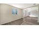 Main bedroom with hardwood floors and an arched alcove at 6963 74Th Street E Cir, Bradenton, FL 34203