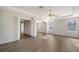 Bright main bedroom featuring hardwood floors and large windows at 6963 74Th Street E Cir, Bradenton, FL 34203