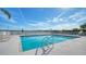 Inviting community pool with ample deck space for lounging at 6963 74Th Street E Cir, Bradenton, FL 34203