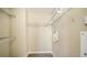 Bright walk-in closet with wire shelving and extra storage at 6963 74Th Street E Cir, Bradenton, FL 34203