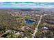 Aerial view showing property location, private lake, and surrounding landscape at 7321 Proctor Rd, Sarasota, FL 34241