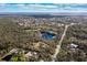 Aerial view showing property location near a lake and residential area at 7321 Proctor Rd, Sarasota, FL 34241