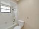 Bathroom with shower/tub combo and updated fixtures at 7321 Proctor Rd, Sarasota, FL 34241