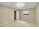 Bedroom with tile floors, window and closet at 7321 Proctor Rd, Sarasota, FL 34241