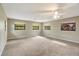 Spacious bedroom with carpet, ceiling fan, and ample natural light at 7321 Proctor Rd, Sarasota, FL 34241