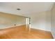 Spacious living room with light walls and wood-look floors at 7321 Proctor Rd, Sarasota, FL 34241