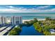 Aerial view of condo complex near the beach and lagoon at 19 Whispering Sands Dr # 103, Sarasota, FL 34242