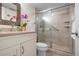 Clean bathroom with shower, toilet and vanity at 19 Whispering Sands Dr # 103, Sarasota, FL 34242