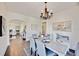 Bright dining room with hardwood floors, chandelier, and elegant decor at 2509 14Th W Ave, Bradenton, FL 34205