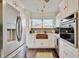 Updated kitchen, featuring copper farmhouse sink and stainless steel appliances at 2509 14Th W Ave, Bradenton, FL 34205