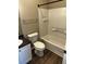 Bathroom features a vanity with white cabinets and a tub with white tile at 4802 51St W St # 1406, Bradenton, FL 34210