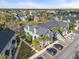 Community view, featuring a lake and numerous houses at 5560 Rosehill Rd # 201, Sarasota, FL 34233
