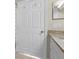 Clean bathroom with granite countertop and double sink at 5560 Rosehill Rd # 201, Sarasota, FL 34233