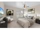 Bright bedroom with a large bed and neutral decor at 5560 Rosehill Rd # 201, Sarasota, FL 34233