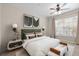 Bright bedroom with large window, plush bed, and stylish decor at 5560 Rosehill Rd # 201, Sarasota, FL 34233