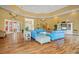 Bright and airy community room with hardwood floors and comfy seating at 5560 Rosehill Rd # 201, Sarasota, FL 34233