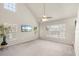 Living area with vaulted ceilings and large windows at 5560 Rosehill Rd # 201, Sarasota, FL 34233