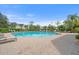 Community swimming pool with plenty of lounge chairs at 5560 Rosehill Rd # 201, Sarasota, FL 34233