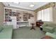 Community library with bookshelves and comfortable seating at 5763 Sabal Trace Dr # 202 Bd5763, North Port, FL 34287