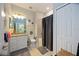 Clean bathroom with granite vanity and a shower/tub combo at 5830 Wake Forest Run # 102, Bradenton, FL 34211