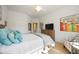 Bright bedroom with a comfortable bed and plenty of natural light at 5830 Wake Forest Run # 102, Bradenton, FL 34211