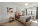 Cozy bedroom with a double bed and built-in workspace at 5830 Wake Forest Run # 102, Bradenton, FL 34211