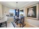 Elegant dining area with a view and stylish decor at 5830 Wake Forest Run # 102, Bradenton, FL 34211