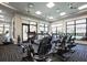 Modern fitness center with treadmills, stationary bikes, and strength training equipment at 5830 Wake Forest Run # 102, Bradenton, FL 34211