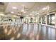 Bright fitness studio with hardwood floors and large windows at 5830 Wake Forest Run # 102, Bradenton, FL 34211