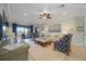 Elegant living room boasts ample natural light and stylish furnishings at 5830 Wake Forest Run # 102, Bradenton, FL 34211