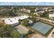 Complex overview with tennis and shuffleboard courts at 5973 Terrace Park N Dr # 208, St Petersburg, FL 33709