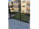 Private screened balcony overlooking a courtyard at 5973 Terrace Park N Dr # 208, St Petersburg, FL 33709