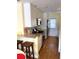 Galley kitchen with granite countertops and appliances at 5973 Terrace Park N Dr # 208, St Petersburg, FL 33709