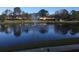 Serene lake view with fountain and landscaping at 5973 Terrace Park N Dr # 208, St Petersburg, FL 33709